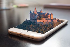 castello in 3d che emerge da uno schermo dello smartphone